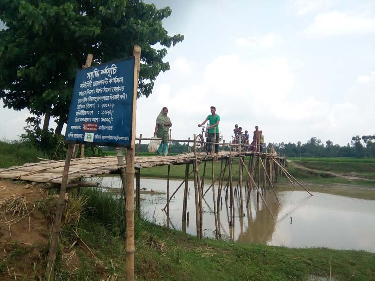 A wooden bridge constructed under the community-based development activities of ENRICH