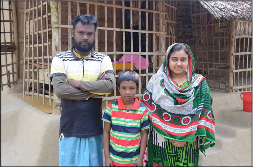 Munira with her husband and son